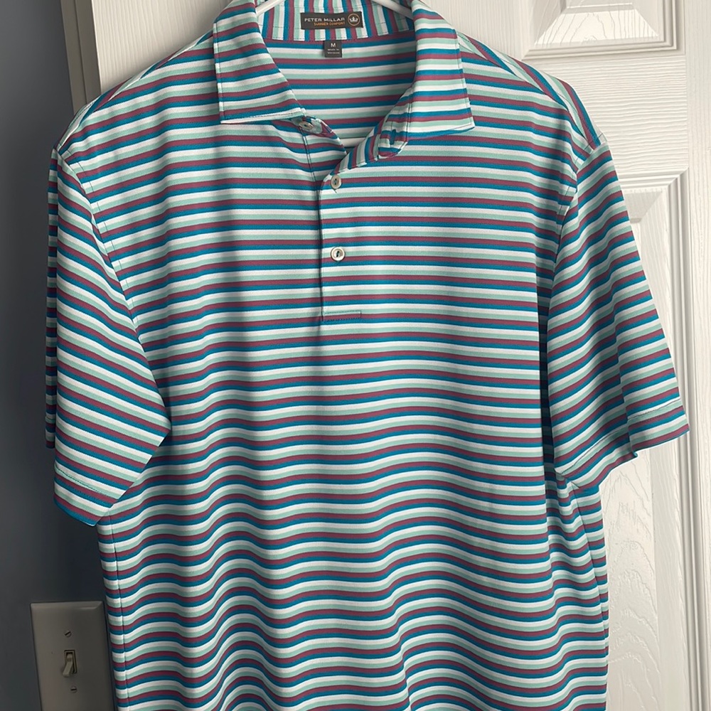 Peter Millar nice, never been worn golf shirt.